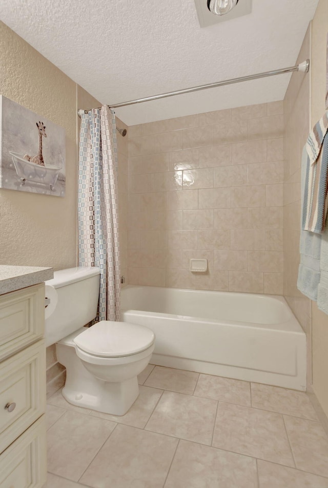 full bathroom with vanity, shower / bathtub combination with curtain, a textured ceiling, tile flooring, and toilet