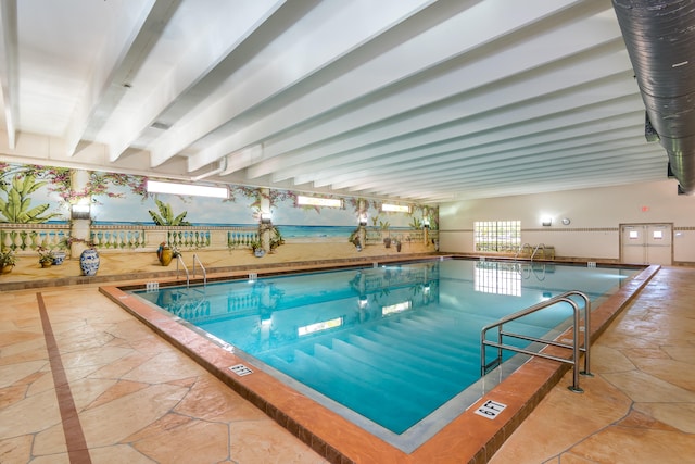 view of pool featuring a patio area