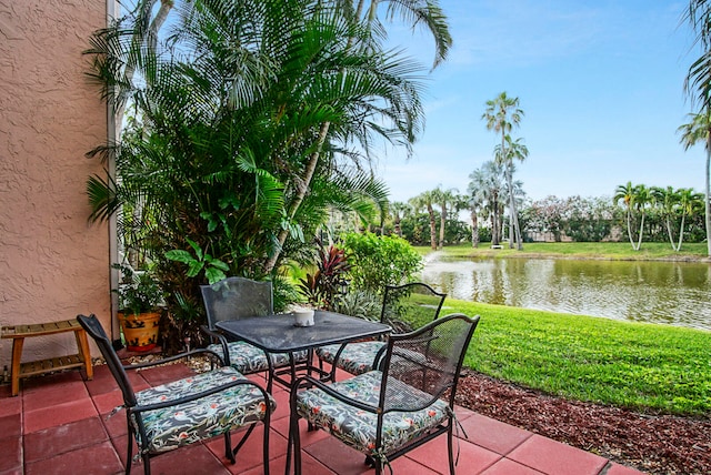 view of patio featuring a water view