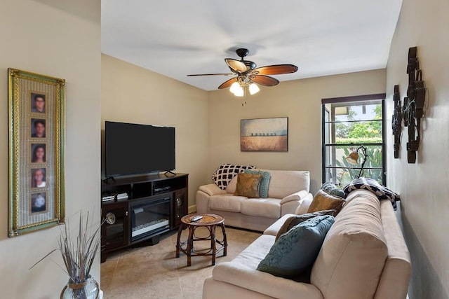 tiled living room featuring ceiling fan