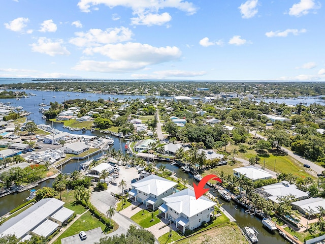 bird's eye view with a water view