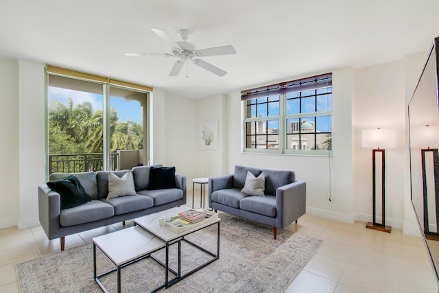 living room featuring ceiling fan and light tile floors