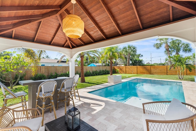 view of pool with a lawn, a gazebo, and a patio