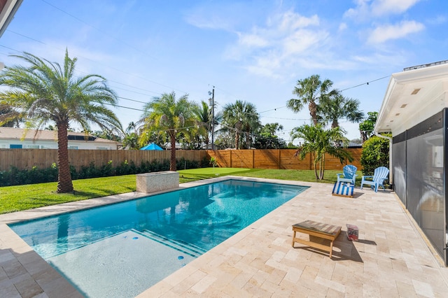 view of pool featuring a yard, a patio area, a fenced backyard, and a fenced in pool