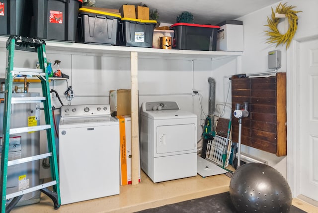 laundry room featuring washer and dryer, laundry area, and water heater