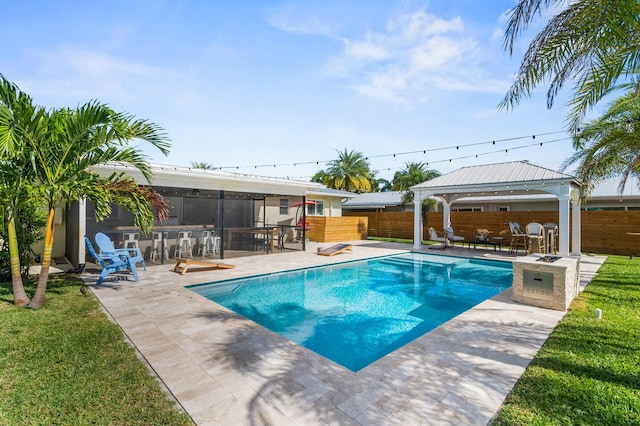 view of swimming pool featuring a fenced in pool, a gazebo, a sunroom, a patio area, and fence