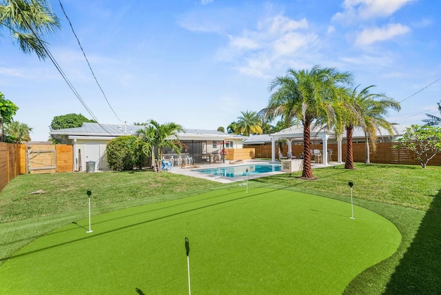 surrounding community with a gazebo, a fenced backyard, and a pool