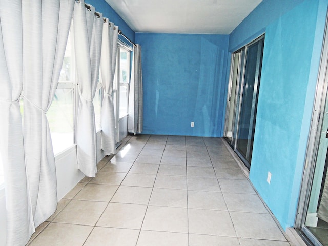 empty room with light tile flooring