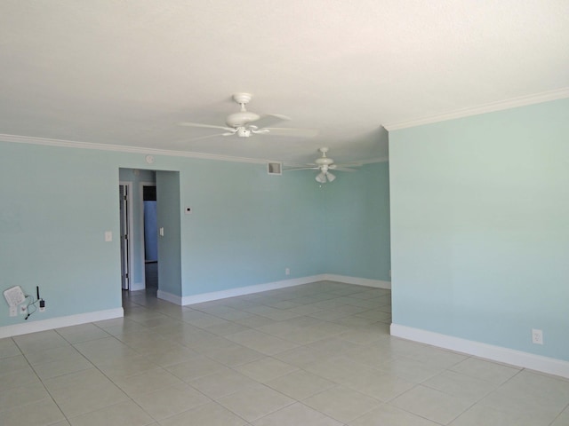 empty room featuring ceiling fan, ornamental molding, and light tile floors