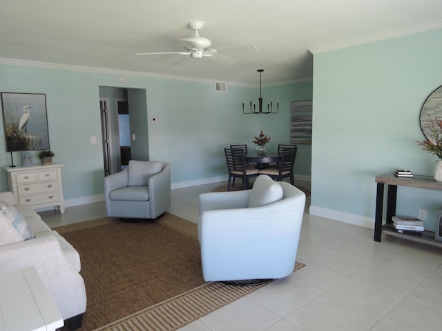 living room featuring ornamental molding, light tile patterned floors, and ceiling fan