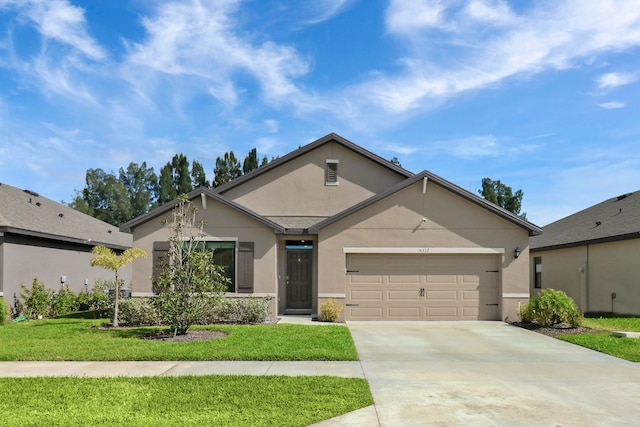 ranch-style home featuring a front yard and a garage