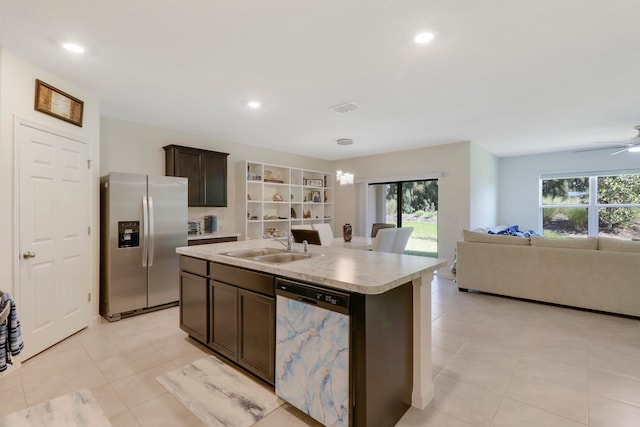 kitchen with dishwashing machine, an island with sink, light tile floors, ceiling fan, and stainless steel refrigerator with ice dispenser