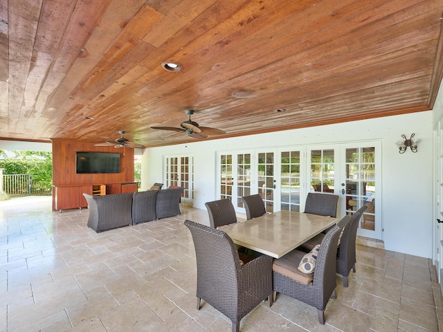 view of patio featuring french doors and ceiling fan