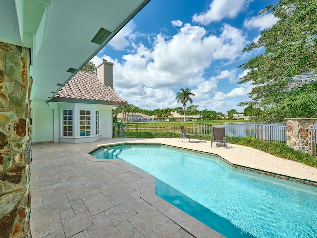 view of pool featuring a patio area