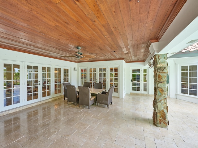 view of terrace with french doors and ceiling fan