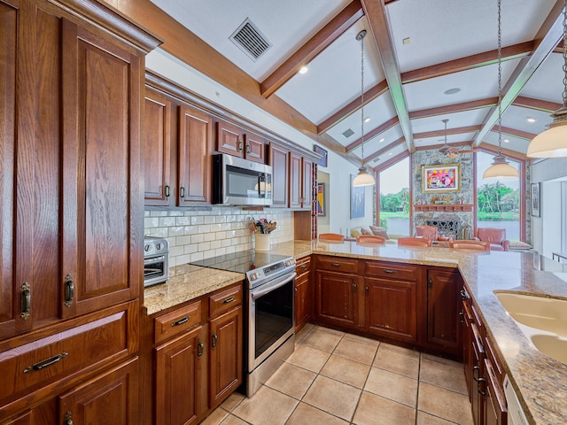 kitchen with stainless steel appliances, vaulted ceiling with beams, tasteful backsplash, pendant lighting, and light tile floors