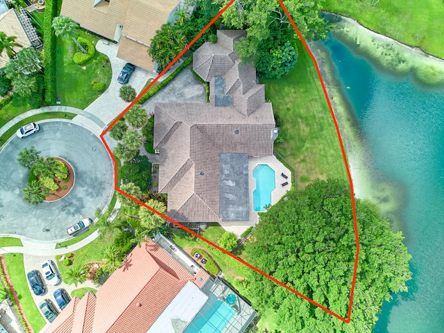 birds eye view of property featuring a water view