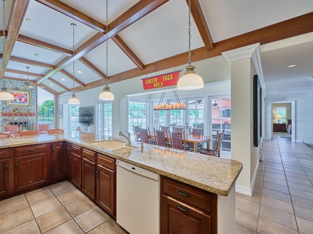 kitchen featuring pendant lighting, lofted ceiling with beams, white dishwasher, and light tile floors