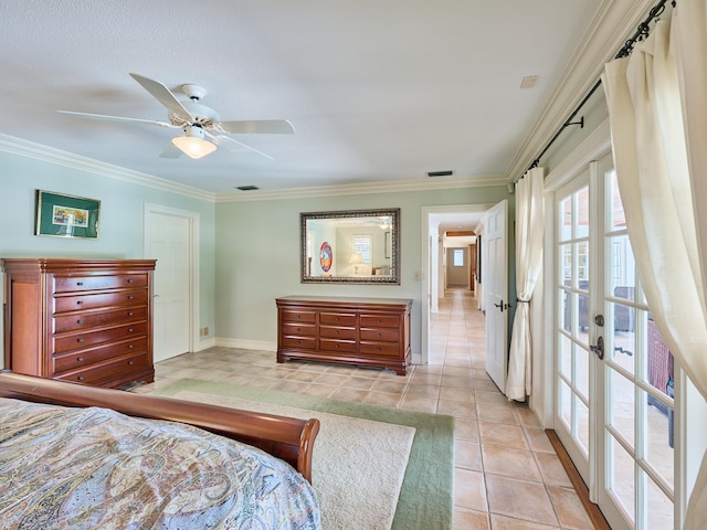 tiled bedroom featuring french doors, ceiling fan, and ornamental molding