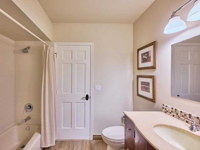 full bathroom with vanity, toilet, and shower / bathtub combination with curtain