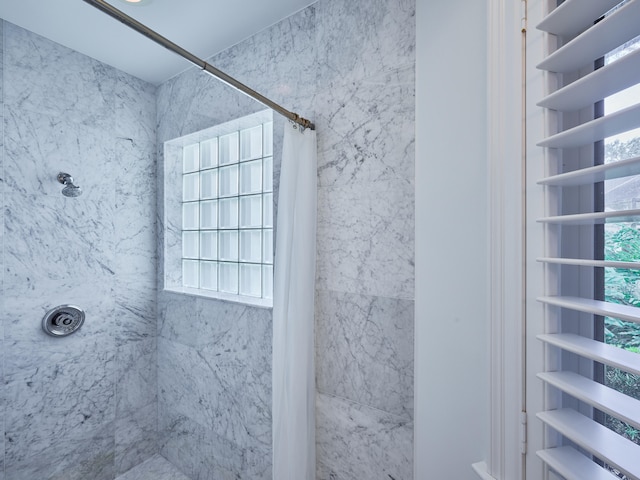 bathroom featuring walk in shower