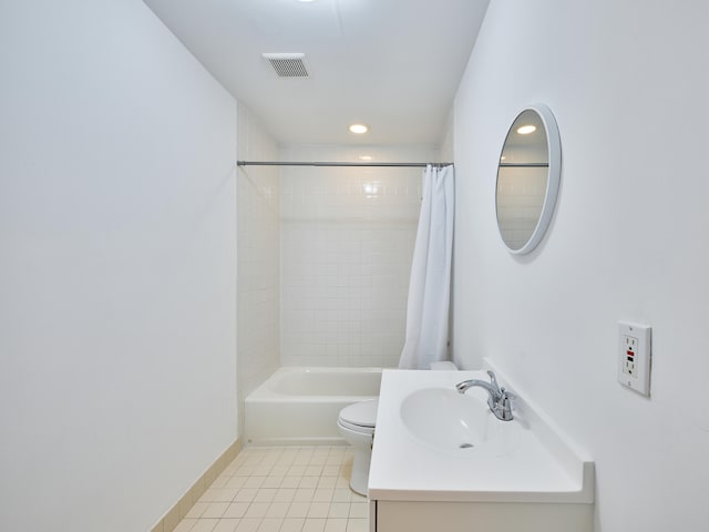 full bathroom featuring tile flooring, oversized vanity, toilet, and shower / tub combo with curtain