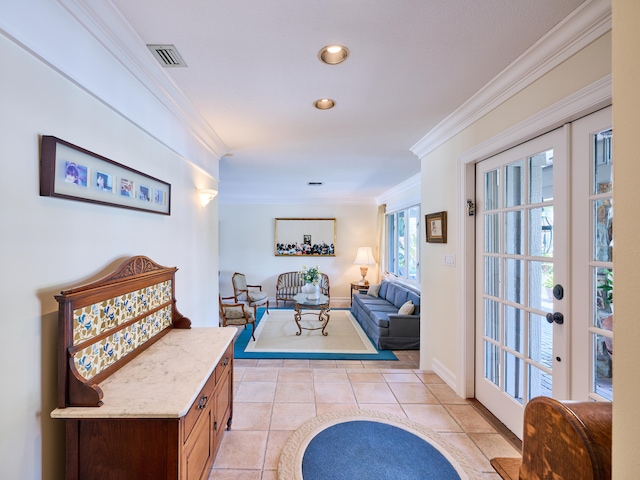 interior space with french doors, light tile floors, and ornamental molding