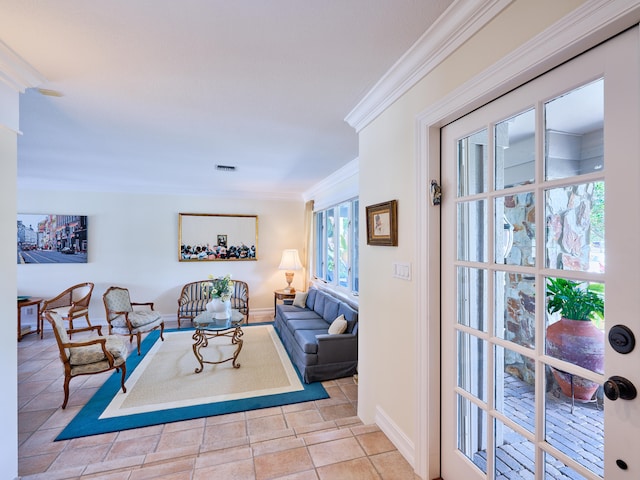 living room featuring crown molding and light tile flooring