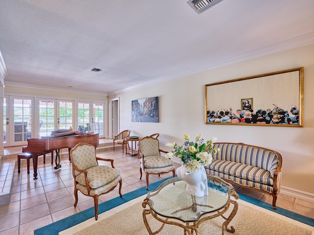 living room with a textured ceiling, light tile floors, and ornamental molding