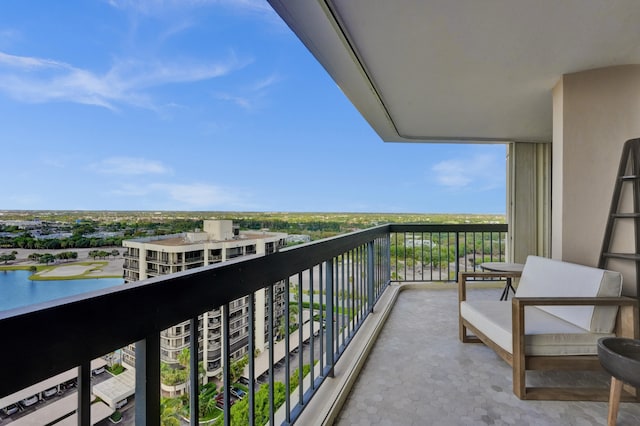 balcony featuring a water view