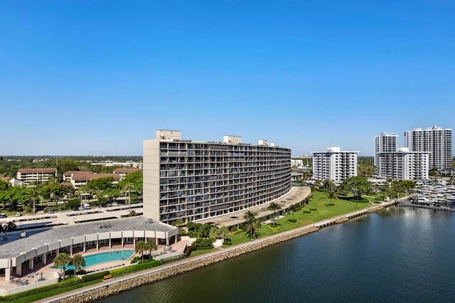 birds eye view of property with a water view