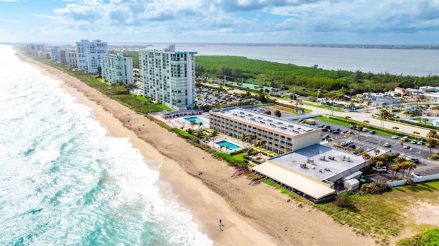 aerial view with a view of the beach and a water view