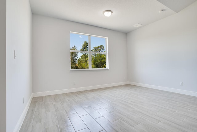 empty room featuring light hardwood / wood-style flooring