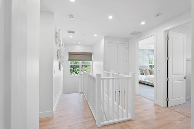 corridor featuring light hardwood / wood-style flooring