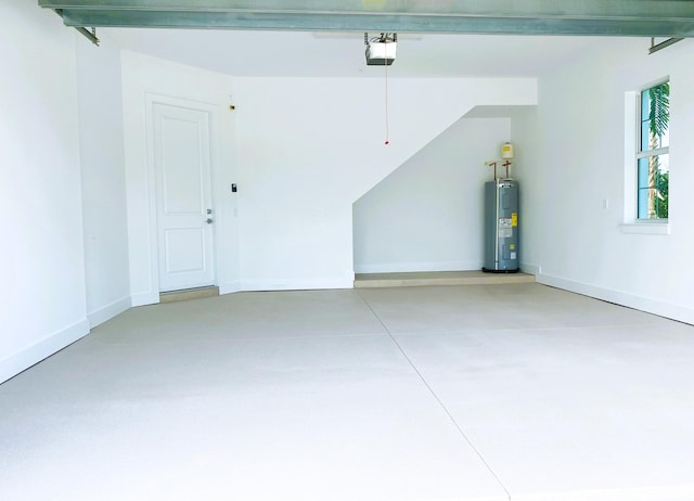 garage with electric water heater and a garage door opener