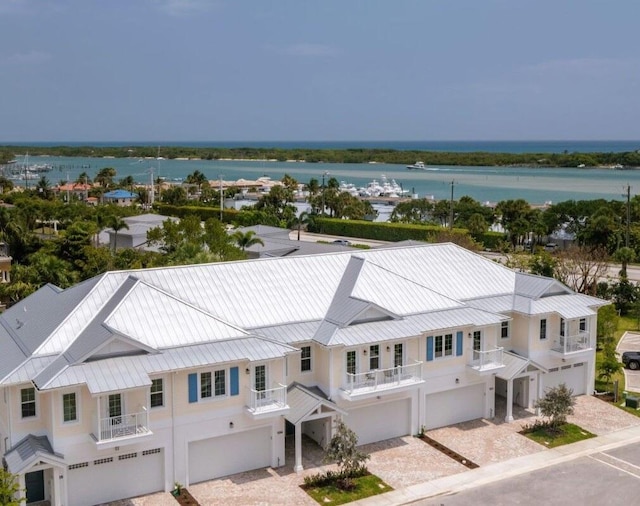 drone / aerial view with a water view