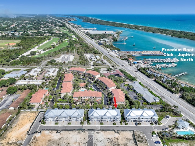 aerial view featuring a residential view and a water view