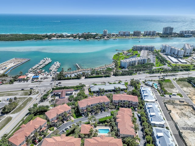 aerial view featuring a city view and a water view
