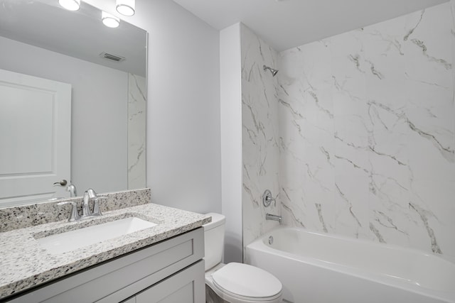 full bathroom with toilet, tiled shower / bath combo, and oversized vanity