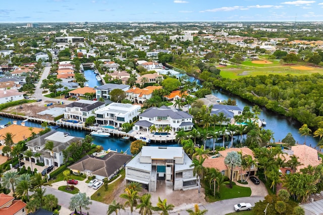 aerial view featuring a water view and a residential view