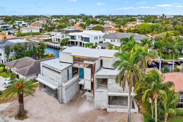 aerial view with a water view and a residential view