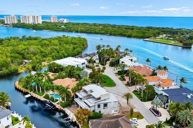 birds eye view of property featuring a water view