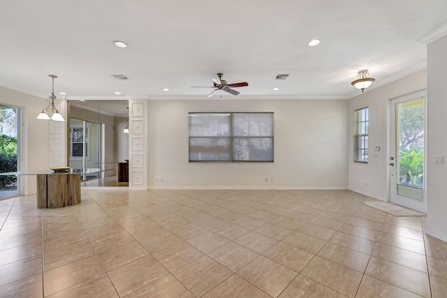 unfurnished living room with a wealth of natural light, crown molding, and light tile flooring