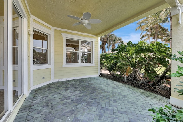 view of patio / terrace featuring ceiling fan