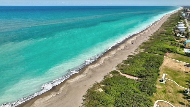 aerial view with a view of the beach and a water view