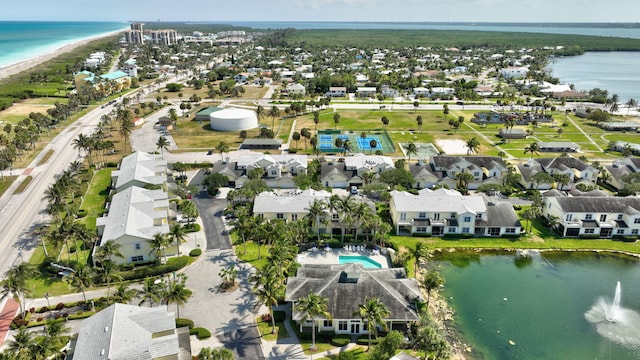 drone / aerial view with a water view