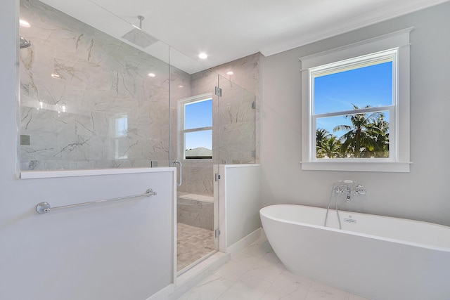 bathroom featuring separate shower and tub