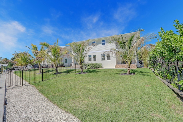 view of front of home with a front yard