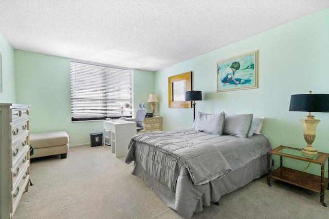 carpeted bedroom with a textured ceiling