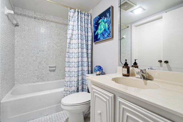 full bathroom featuring toilet, tile patterned floors, vanity, and shower / bathtub combination with curtain